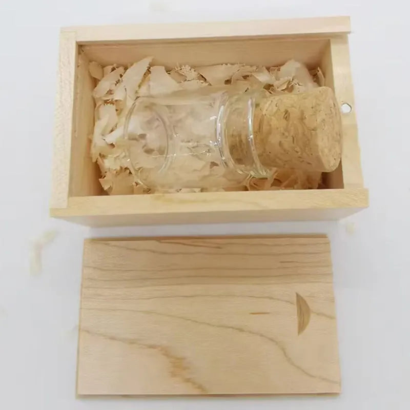 Wooden wish drift bottle USB flash drive with transparent plastic case showing carved wood inside.