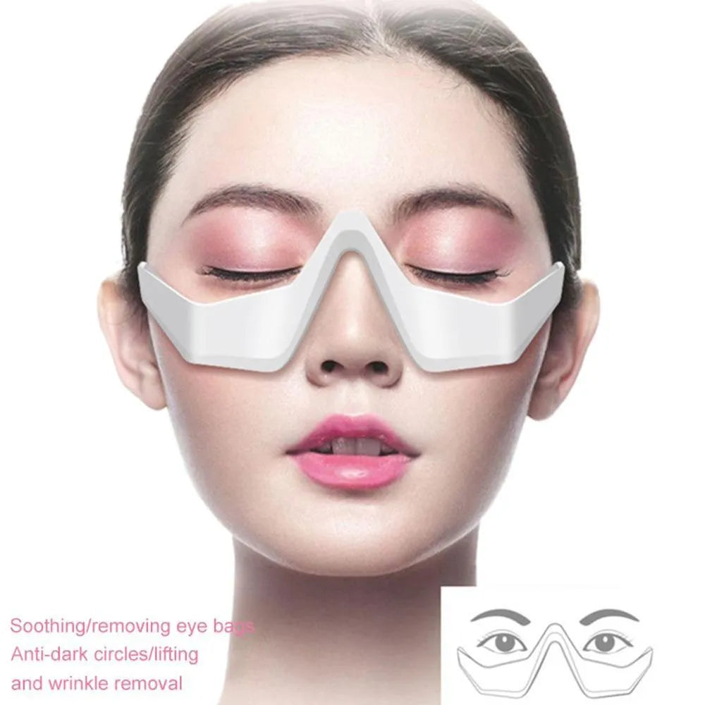 Pink and white micro-current eye massager with glasses-style design for wrinkle reduction and dark circle removal