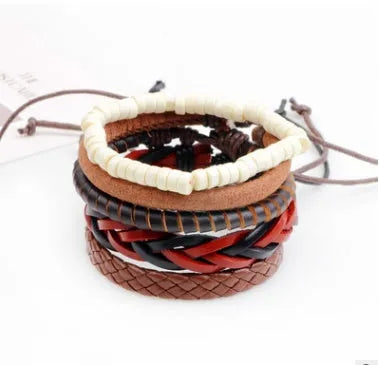 Handmade brown leather wrap bracelet with wooden beads and braided cord on a wrist.