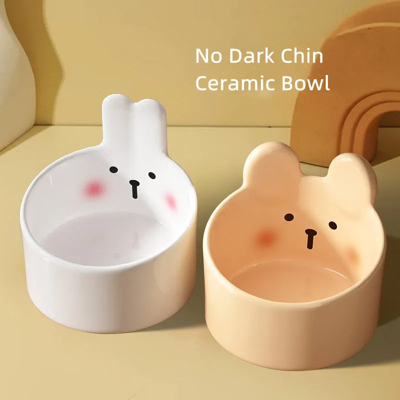 Ceramic pet bowls with neck protection design in white rabbit and brown bear patterns for dogs and cats