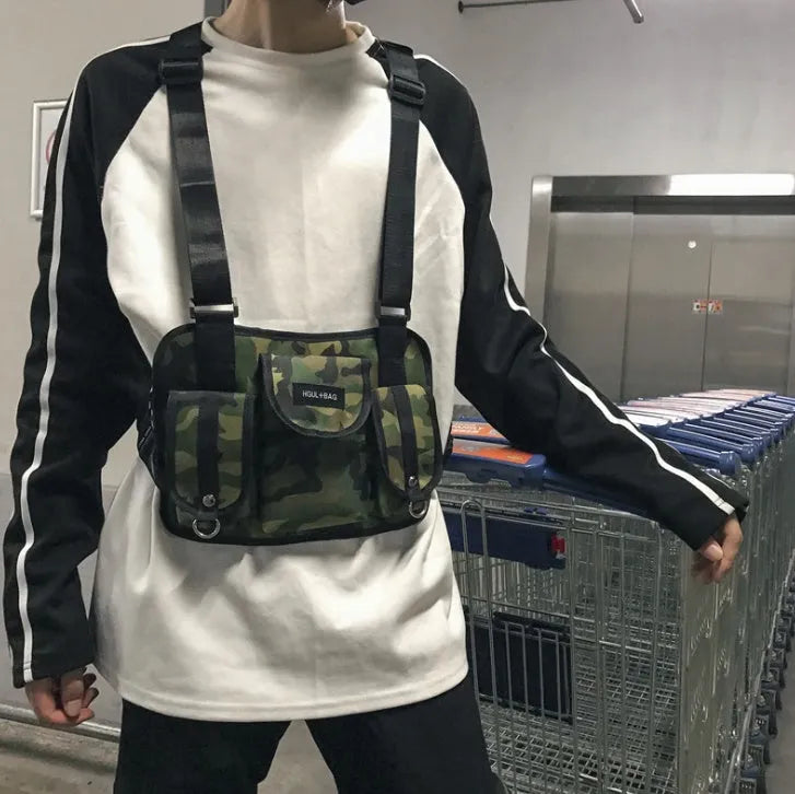 20-35L nylon casual sports backpack with zip pockets, double straps, and soft handle in Black, Camouflage, Gray, or Purple.
