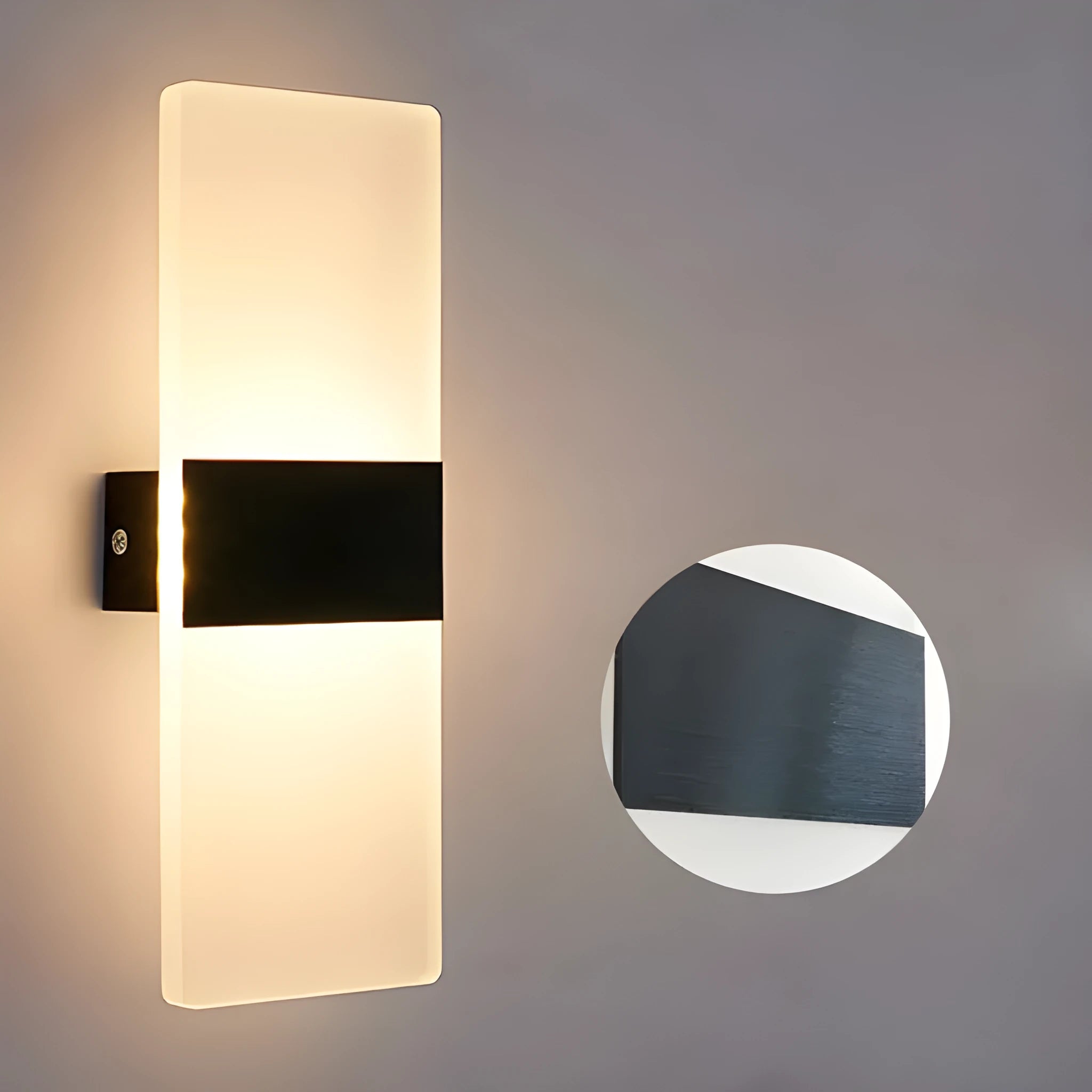 Modern acrylic wall-mounted LED bedside lamp in silver finish showing warm light illumination