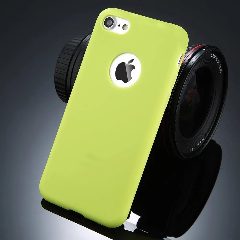 Soft TPU candy colour phone case for iPhone on a table.