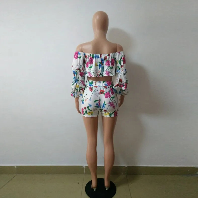 Multicolour digital print women's two-piece tracksuit with pile sleeves on the short top and matching shorts.