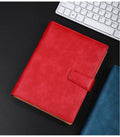 A5 leather notebook with buckle clip and 6-hole binding in multiple colours