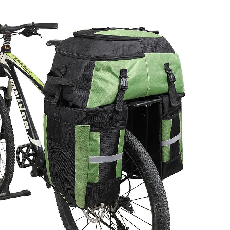 Rhinoceros green 70L bicycle rear storage frame bag mounted on a touring bike.
