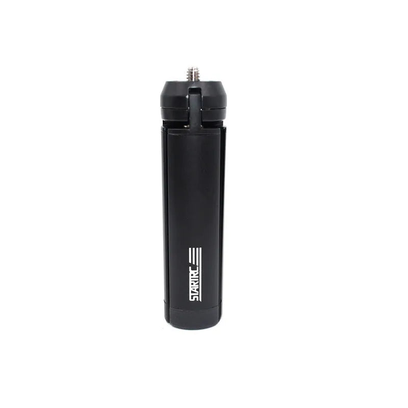 Aluminium alloy handheld bracket accessory for mounting an iPhone onto a table top tripod.