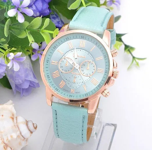 Retro GENEVA three eye quartz watch with leather belt displayed on a table