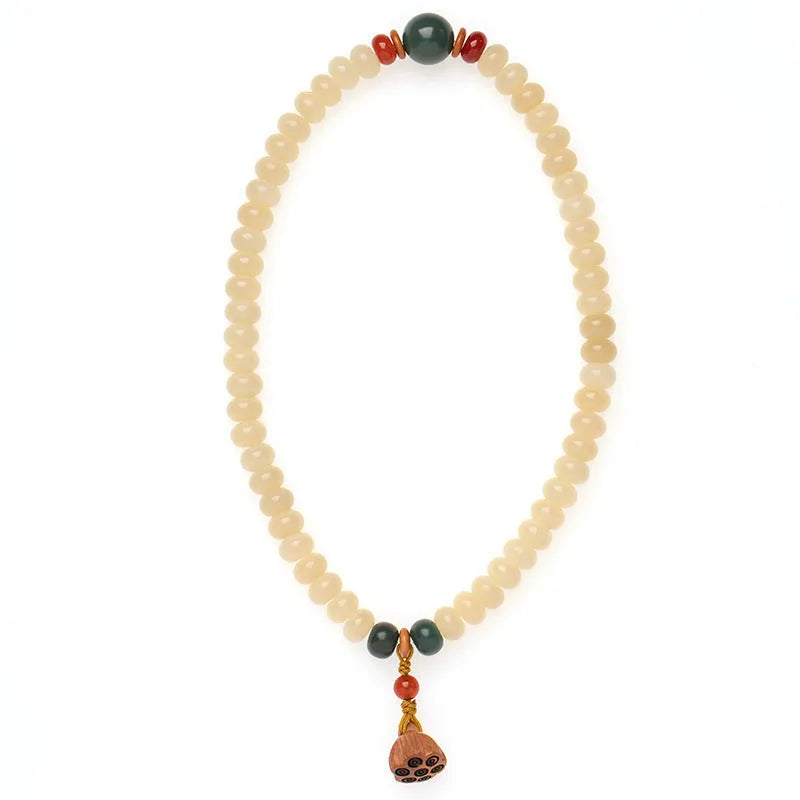 Women's wooden Bodhi root bracelet with 6x9mm flat round beads in cream colour