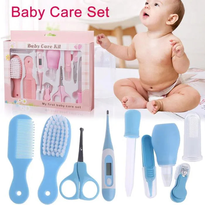 Portable baby health suit 9-piece grooming set in pink with scissors, clippers, comb and thermometer on white background