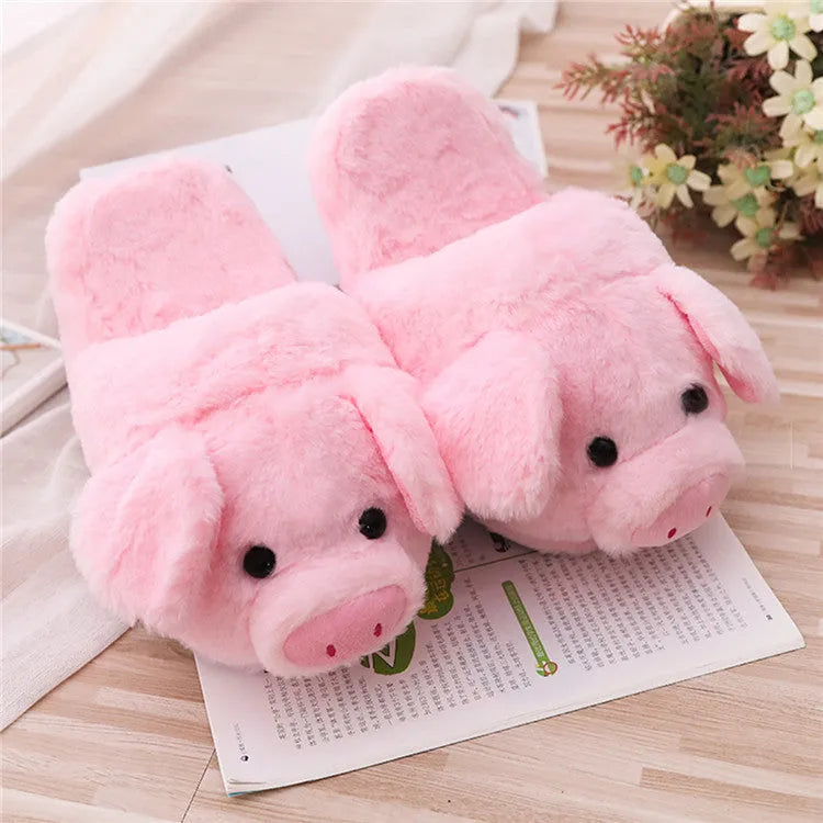 Pink adult pig slippers with short plush lining and a size chart showing international conversions.
