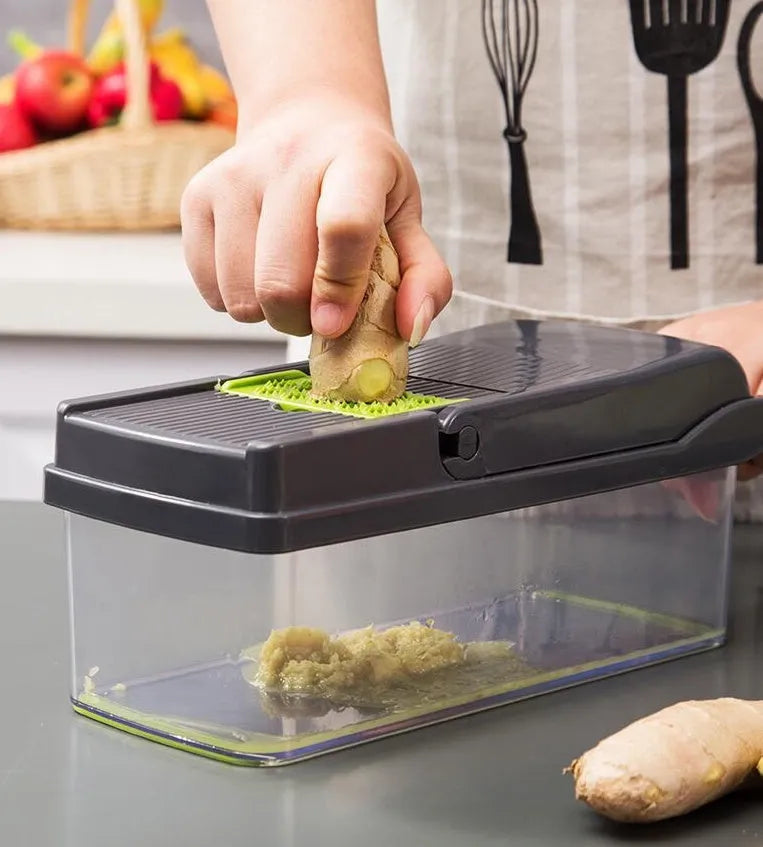Multi-blade vegetable cutter with wheat straw body and seven stainless steel blades for slicing and dicing on a kitchen counter.