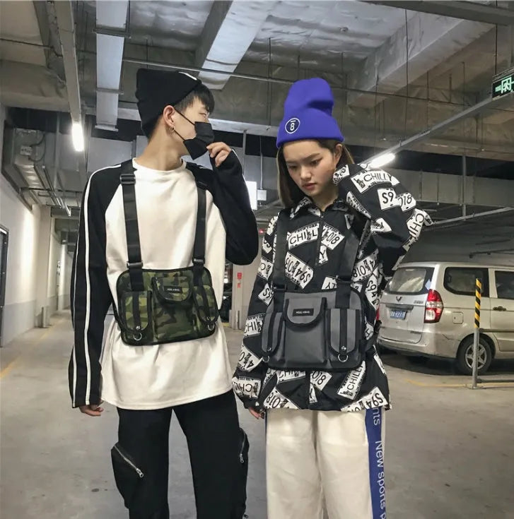 20-35L nylon casual sports backpack with zip pockets, double straps, and soft handle in Black, Camouflage, Gray, or Purple.