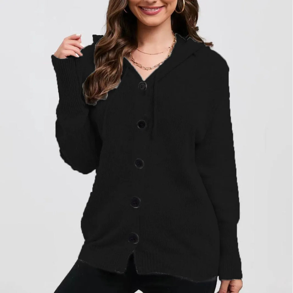 Women's solid colour hooded cardigan in thick cotton fabric showing loose fit and long sleeves