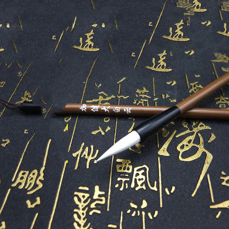 Set of three cloud calligraphy brushes with solid wood handles and round tips in sizes S M L