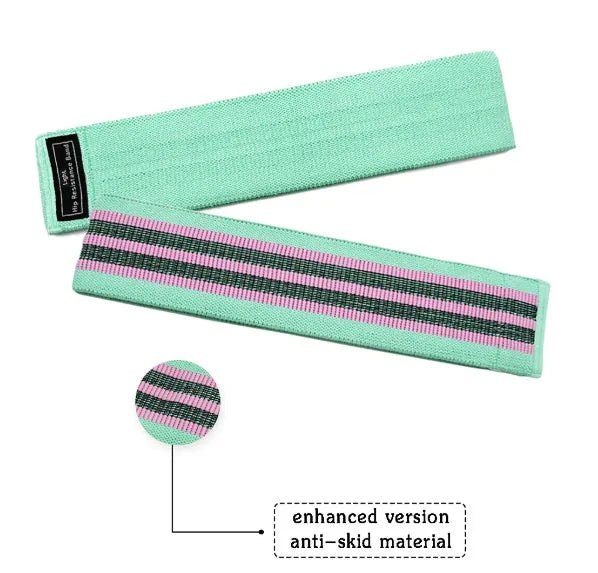 Set of three coloured fabric resistance bands and a net storage bag for home fitness.