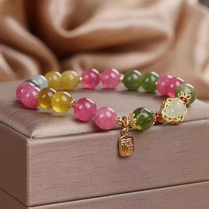 Women's colourful tourmaline bracelet with gourd charm and flower design on mixed materials
