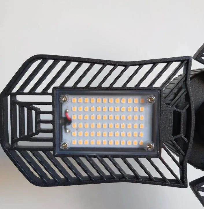 Waterproof industrial foldable garage LED lamp with die-cast aluminium housing.