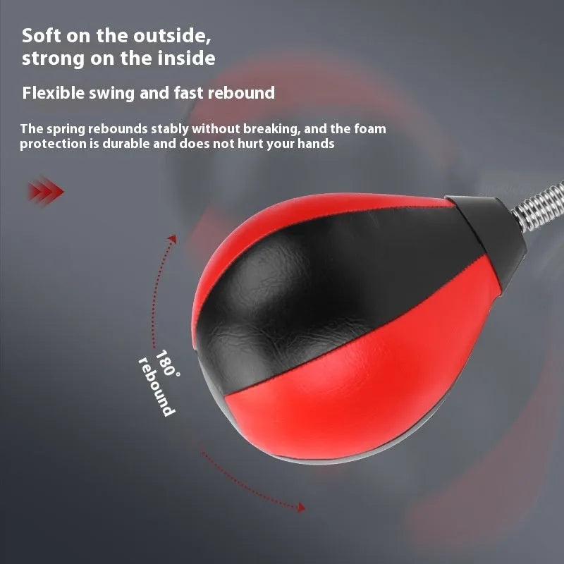 Pear-shaped inflatable punching ball with red and black design mounted with suction cups for boxing training