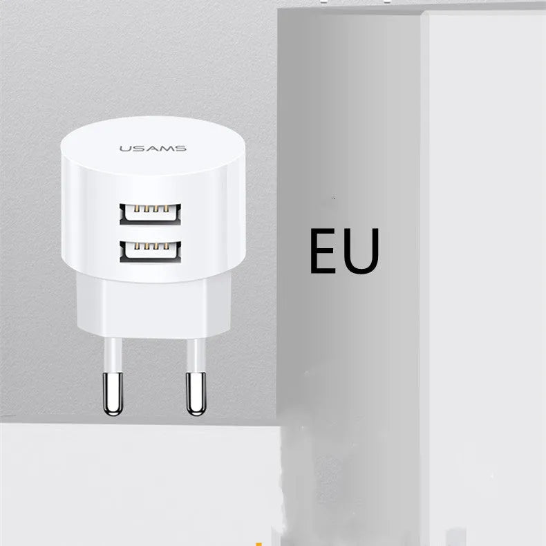 White portable universal dual USB phone charger with US, EU and UK plugs