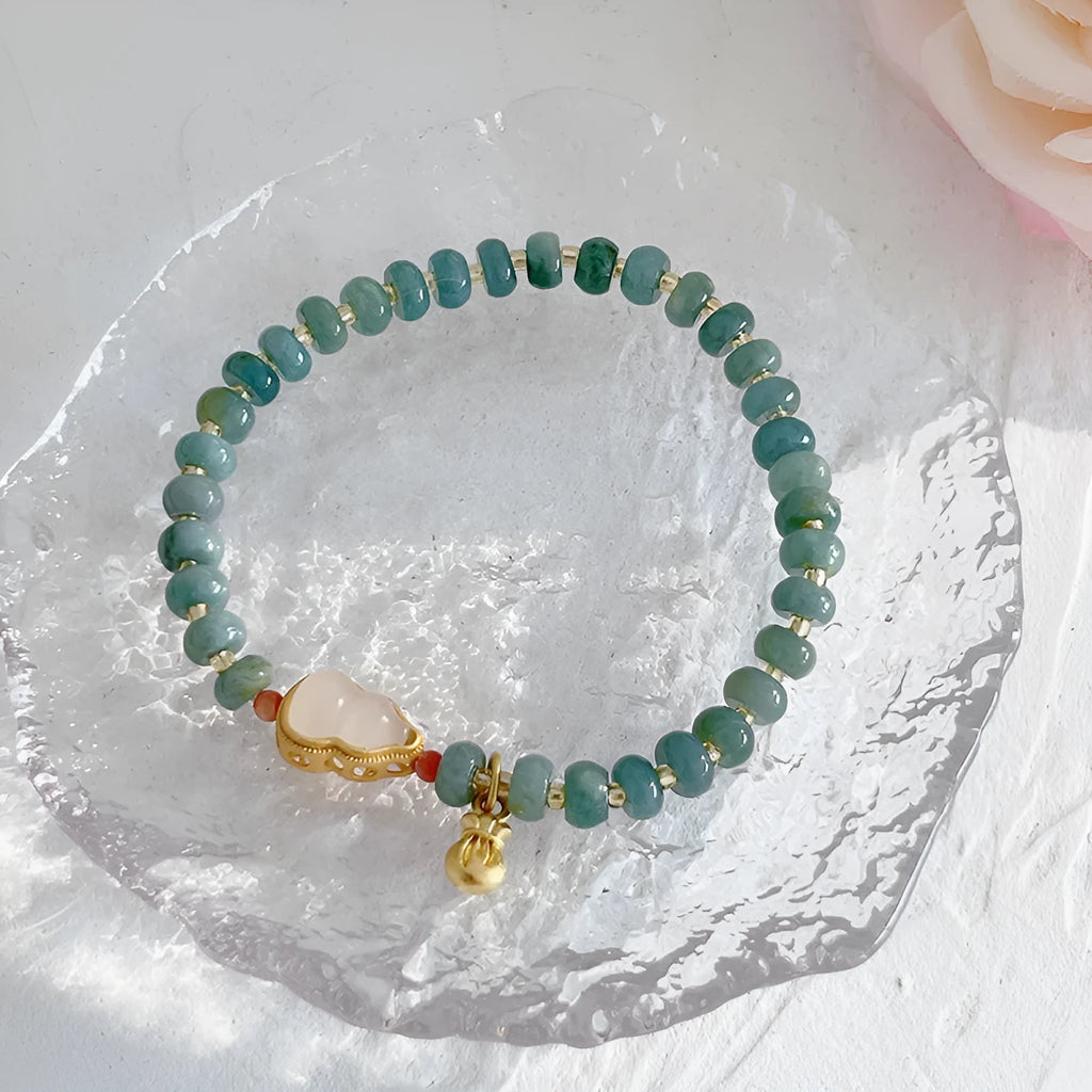 Jade bracelet with gourd pendant and peace buckle charms in natural blue water jade
