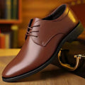 Men's pointed toe business shoes with sequin detail, PU upper, rubber sole, shown in black and brown.