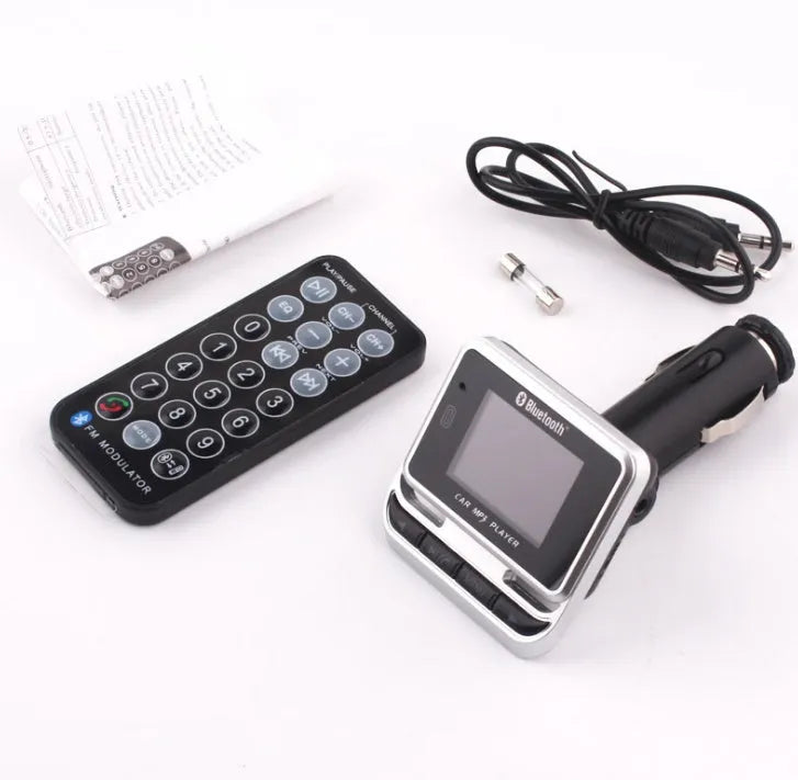 Silver car Bluetooth MP3 player with monochrome screen and ABS plastic body