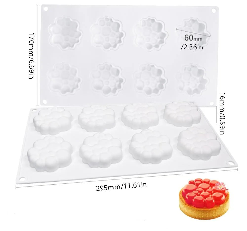 Round silicone cake mould with bubble tower pattern showing 8 raised decorative bubbles