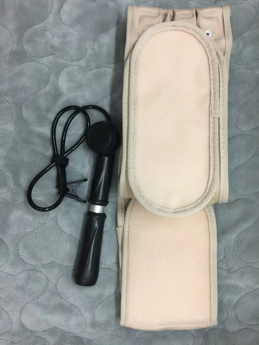 Waist air traction brace belt with inflatable ball and magnetic massage for lumbar spine support, worn on the waist