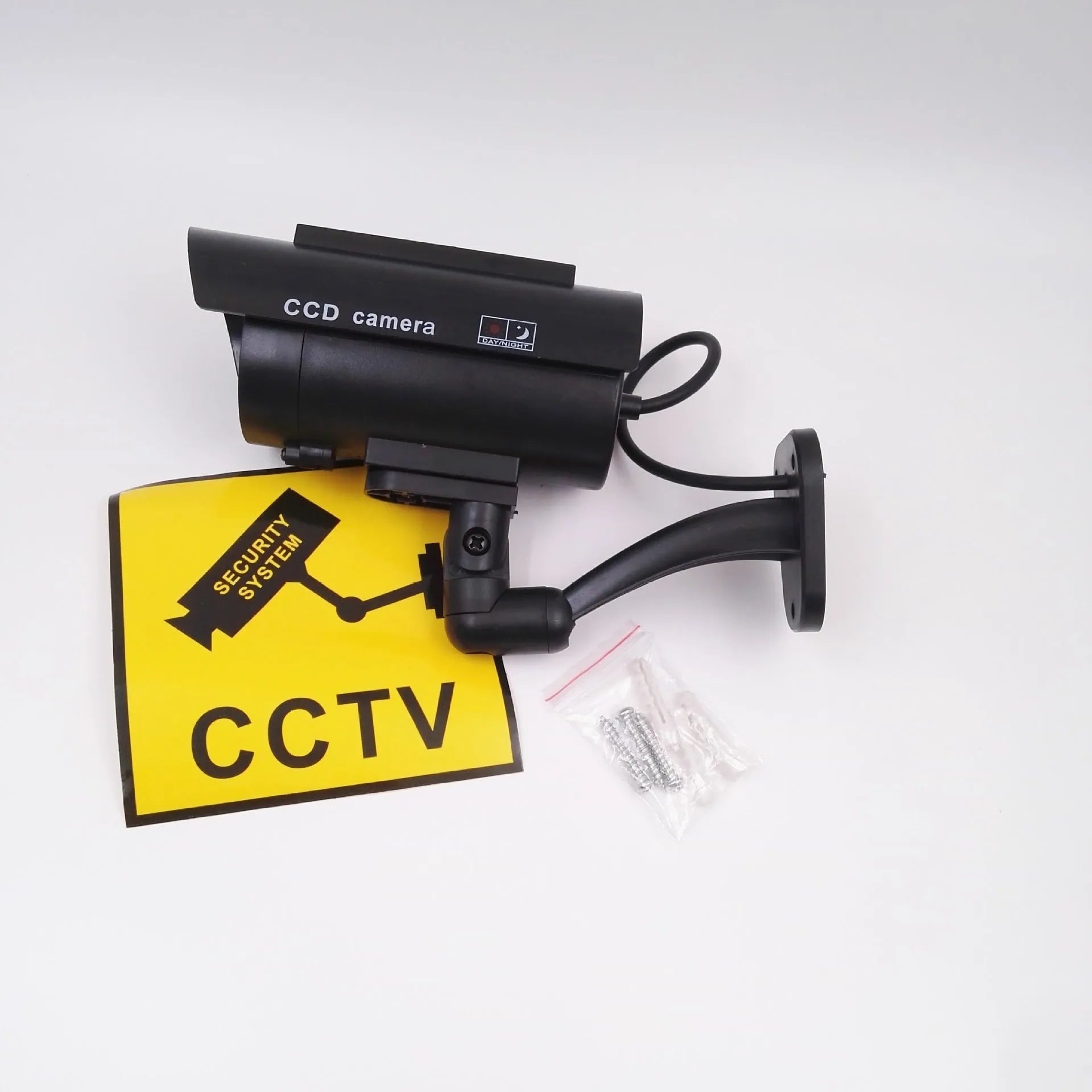 Black gun-style solar dummy camera with flashing red LED light for security deterrent