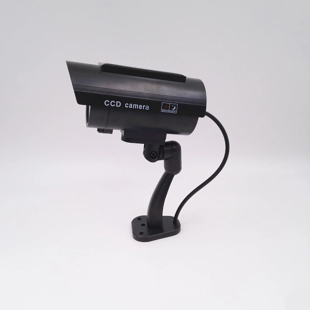 Black gun-style solar dummy camera with flashing red LED light for security deterrent