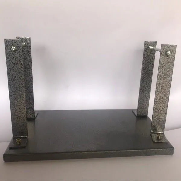 Black iron flip chip bracket accessory for mounting a portable electric planer.