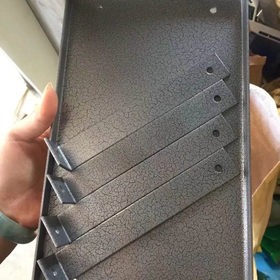 Black iron flip chip bracket accessory for mounting a portable electric planer.