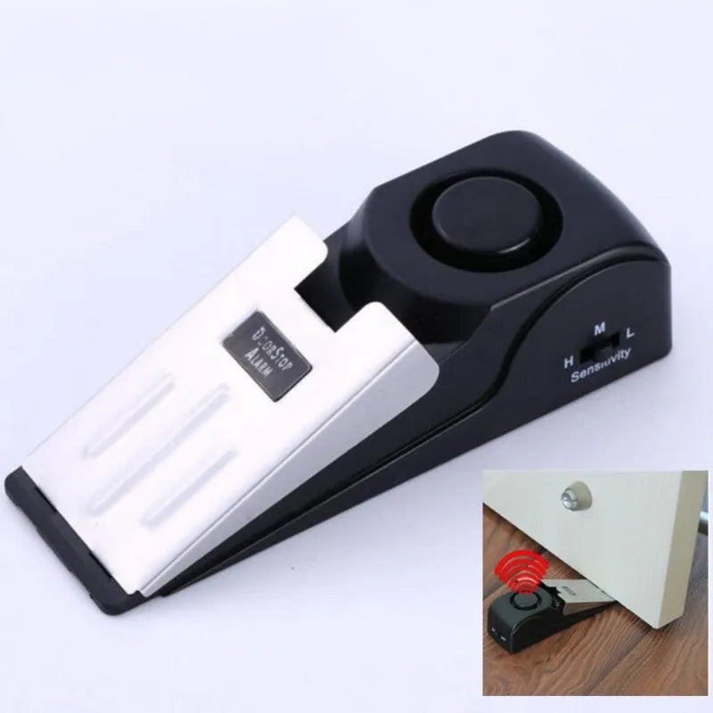 Black 120dB door stop alarm with stainless steel cover and wedge shape