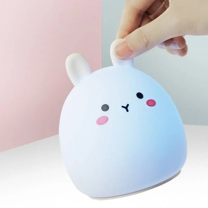 Rechargeable rabbit-shaped night light with silicone construction and LED light source