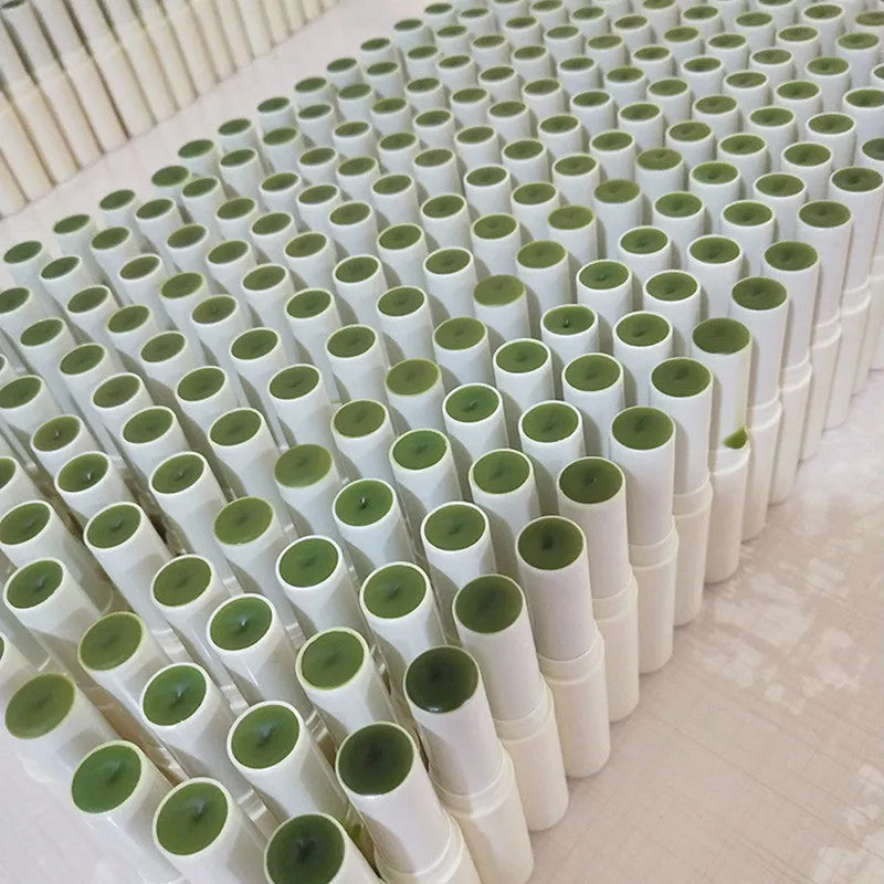 Green Juice VE lip balm in dark green tube, moisturising plant lip balm with vitamin E