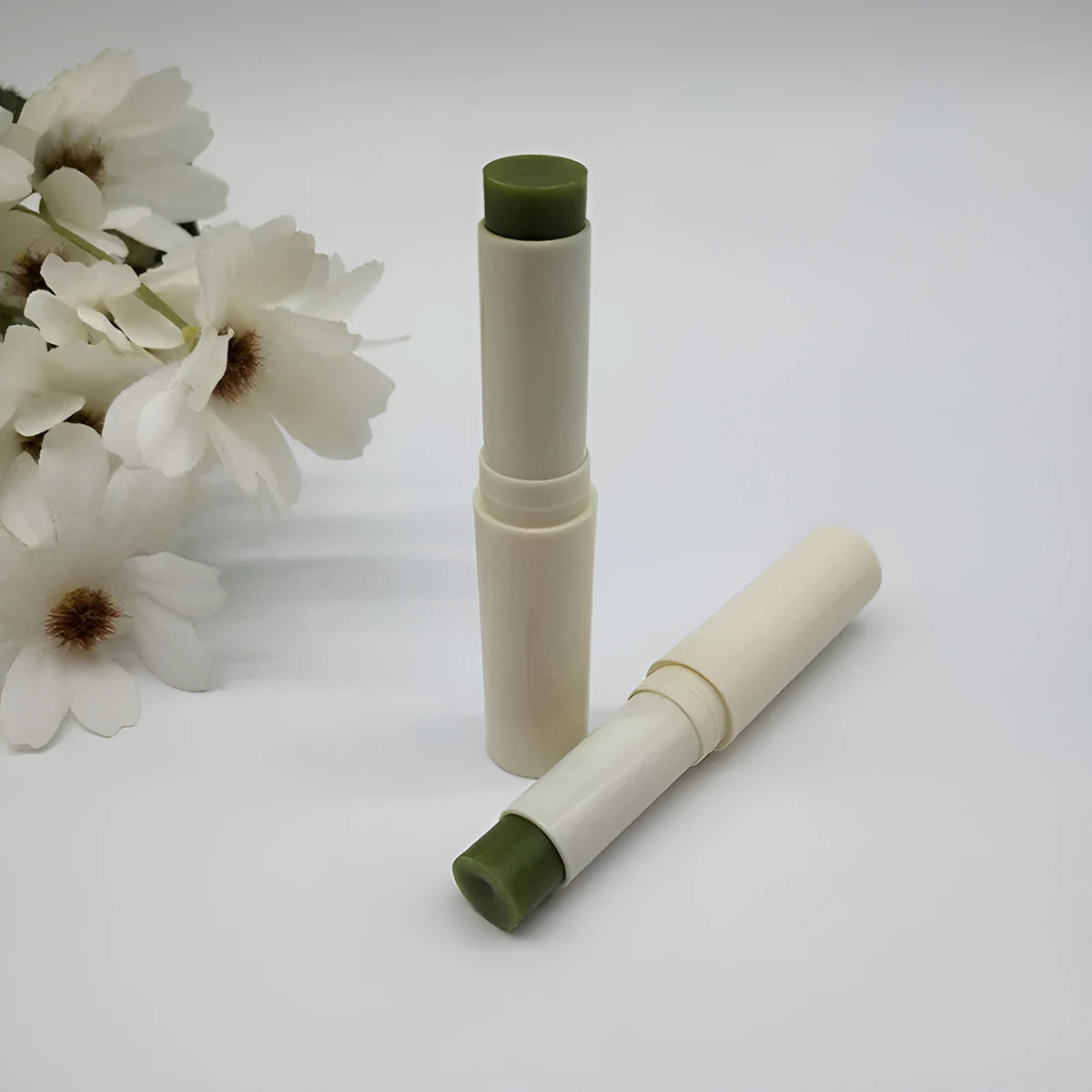 Green Juice VE lip balm in dark green tube, moisturising plant lip balm with vitamin E