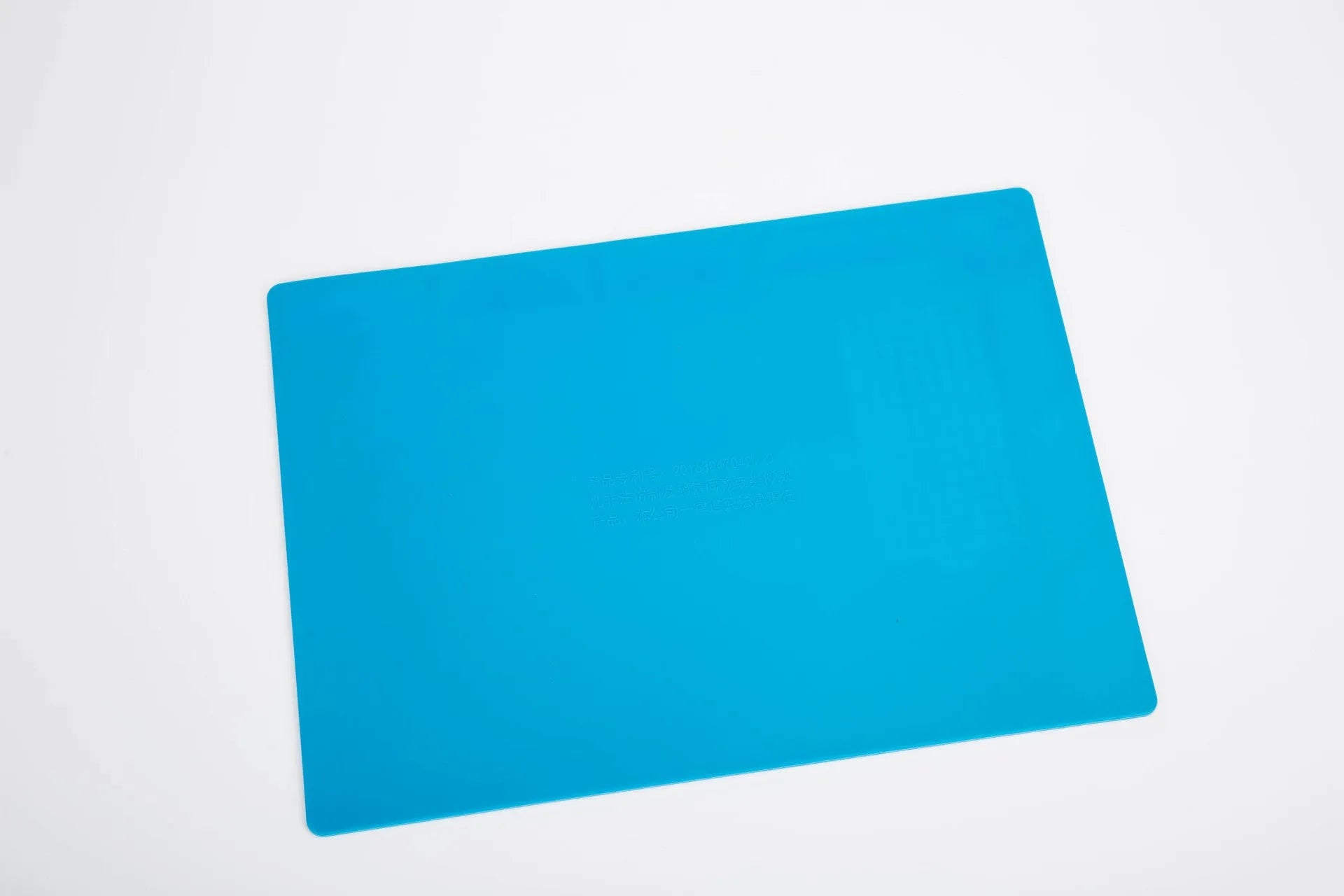 Blue silicone anti-slip desk mat for watch repair with textured surface