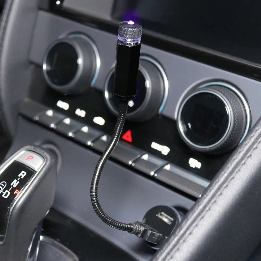 Mini LED car roof star night light projector with metal housing, showing red or purple illumination option