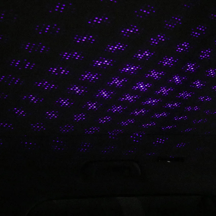 Mini LED car roof star night light projector with metal housing, showing red or purple illumination option