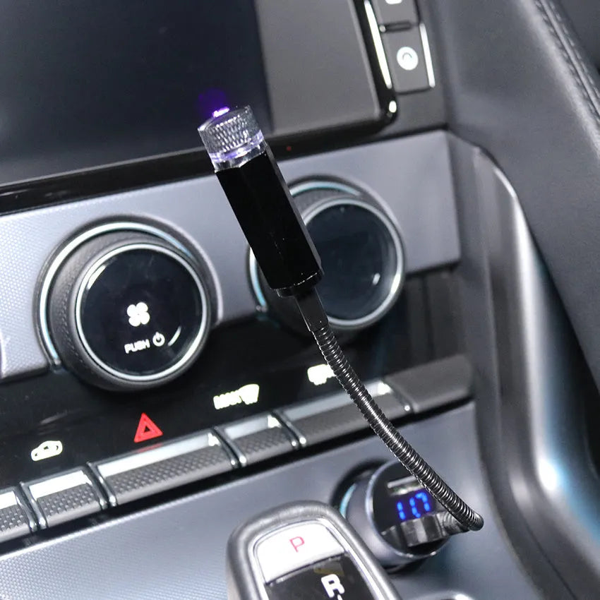 Mini LED car roof star night light projector with metal housing, showing red or purple illumination option