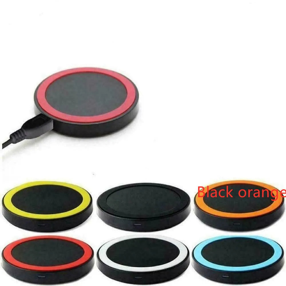Square Qi wireless charging base in six colour options on a wood surface.