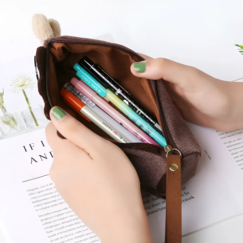 Blue canvas Coconut Horse pencil case with large capacity open showing pens and pencils inside