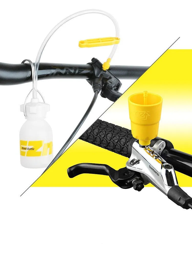 Yellow bicycle brake bleed kit with metal connector on a white background