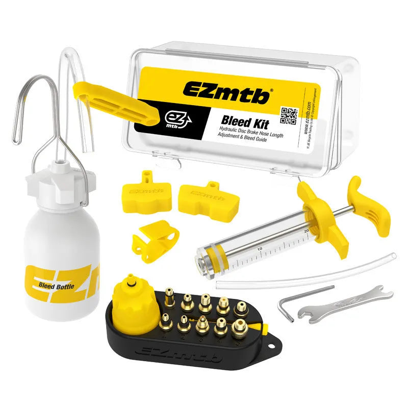 Yellow bicycle brake bleed kit with metal connector on a white background