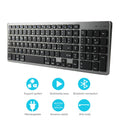 Ultra-thin white rechargeable Bluetooth keyboard next to a tablet and mobile phone.