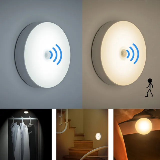Small round beige and white LED motion sensor night light with USB charging cable and adhesive tape.