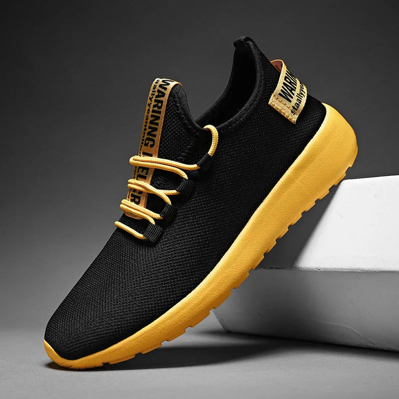 Men's casual breathable sports shoes with flyknit upper and EVA sole, black and yellow colour, plain Korean style design