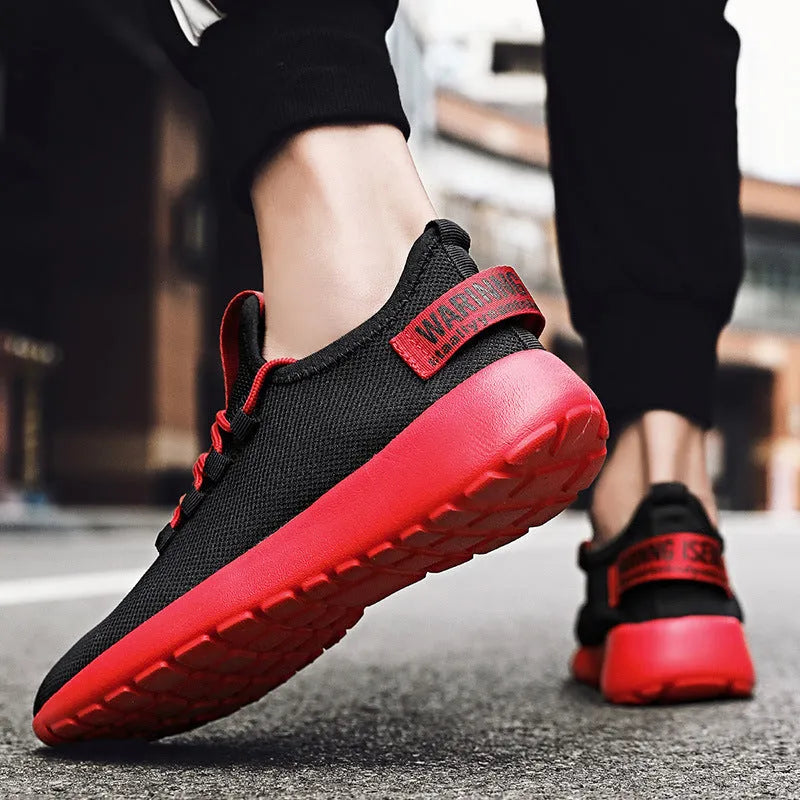 Men's casual breathable sports shoes with flyknit upper and EVA sole, black and yellow colour, plain Korean style design