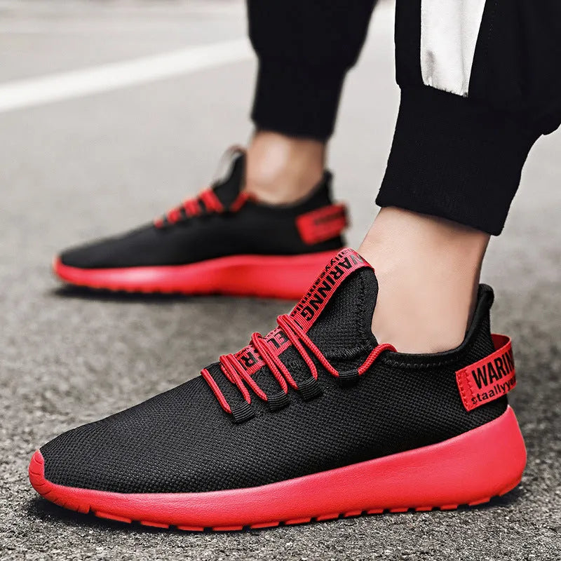 Men's casual breathable sports shoes with flyknit upper and EVA sole, black and yellow colour, plain Korean style design